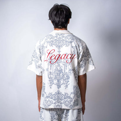 Legacy Printed Shirt back view featuring red embroidered calligraphy on cotton terry